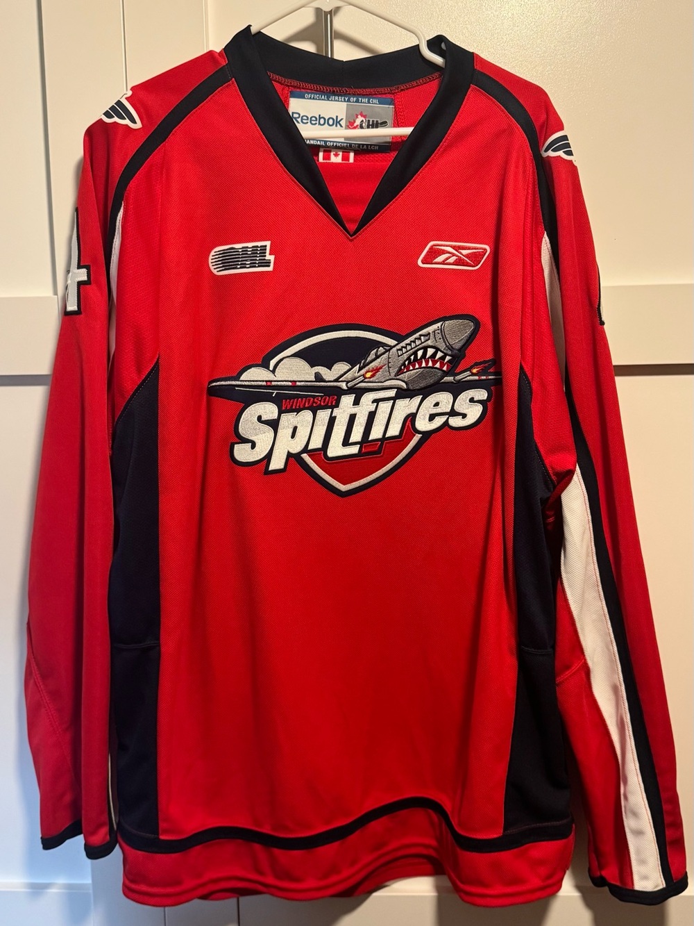 Reebok Red Windsor Spitfires Hockey Jersey with Black & White Accents